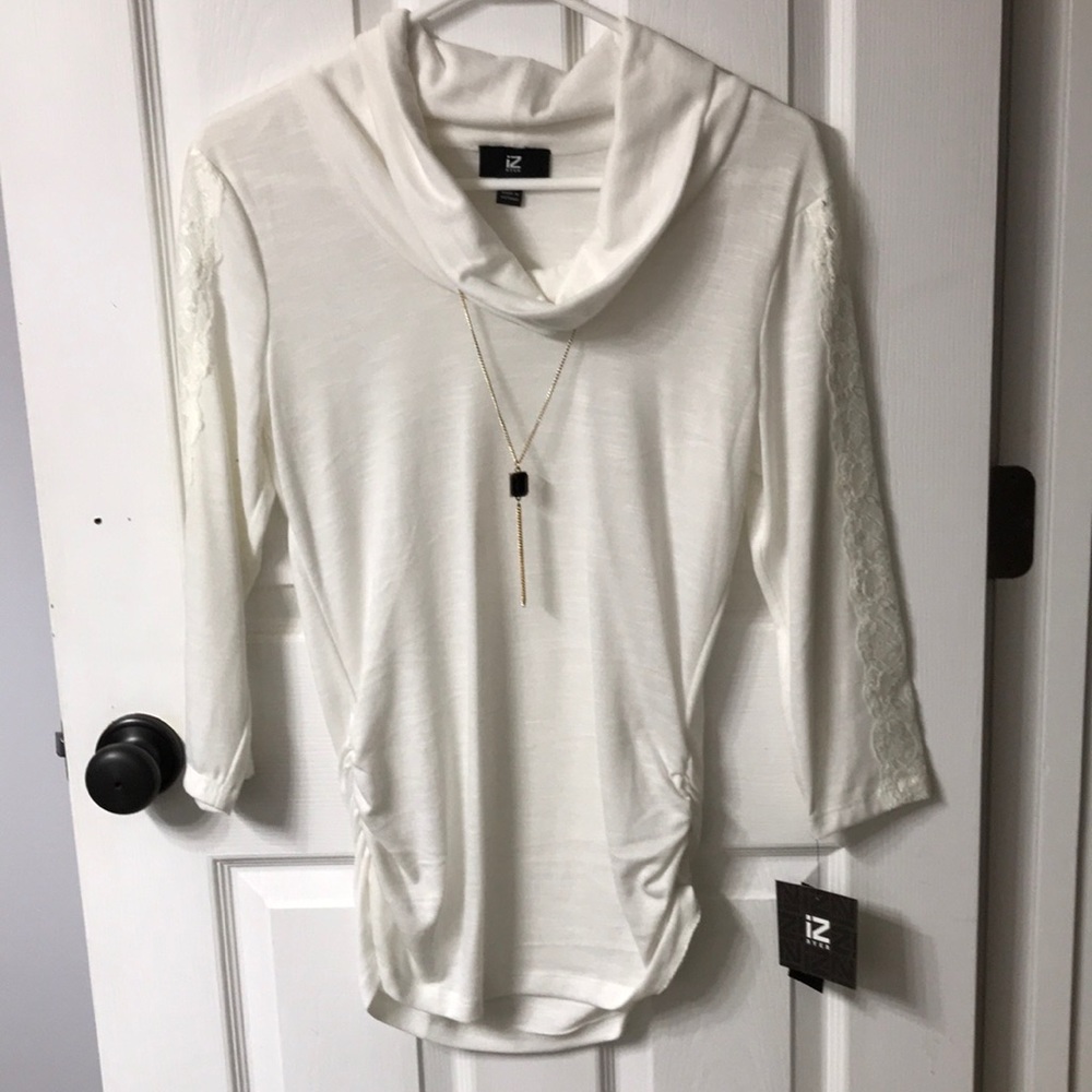 White top with attached necklace